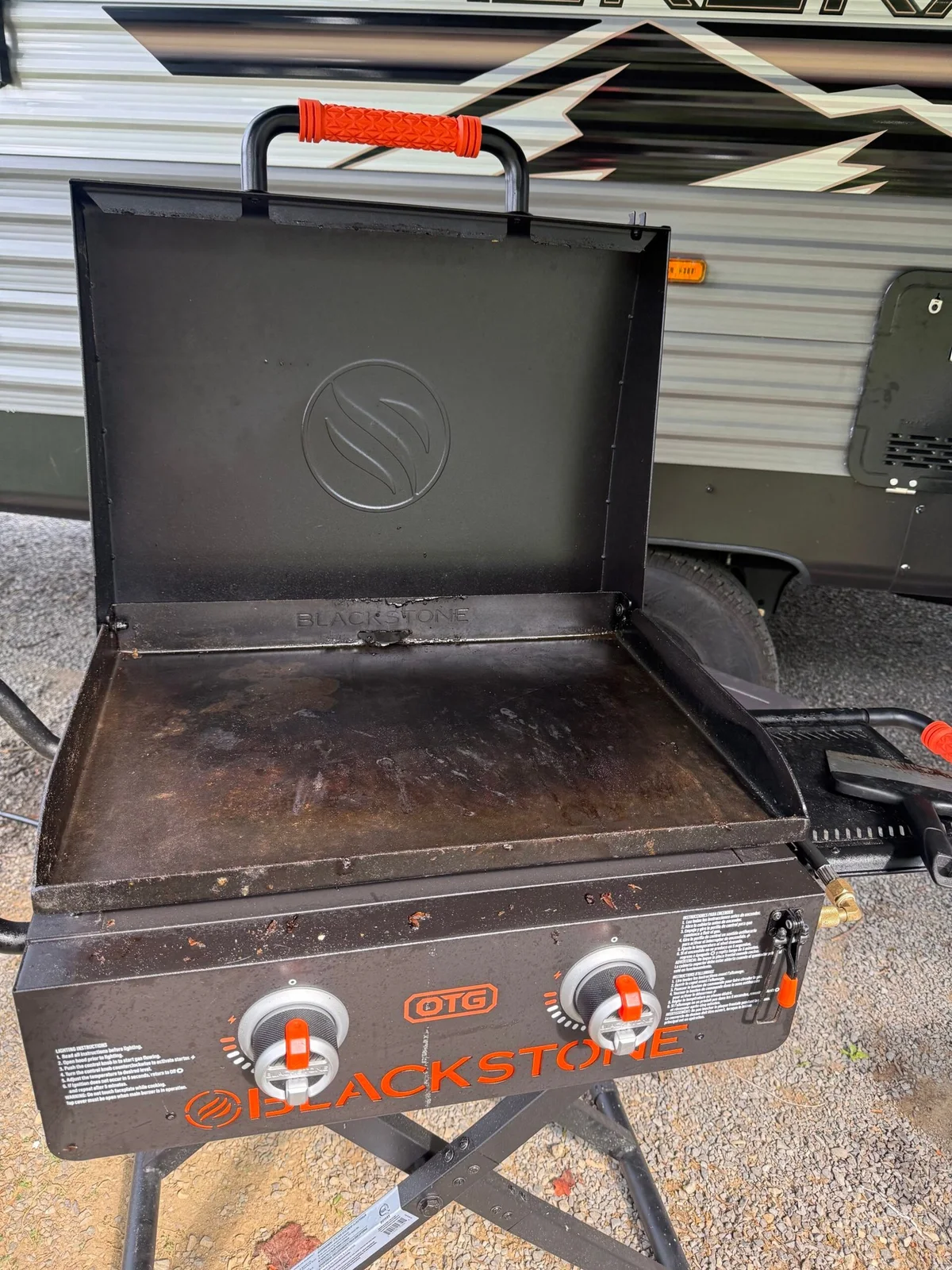 Clean seasoned cooking surface on our Blackstone On the Go griddle after campsite cleanup