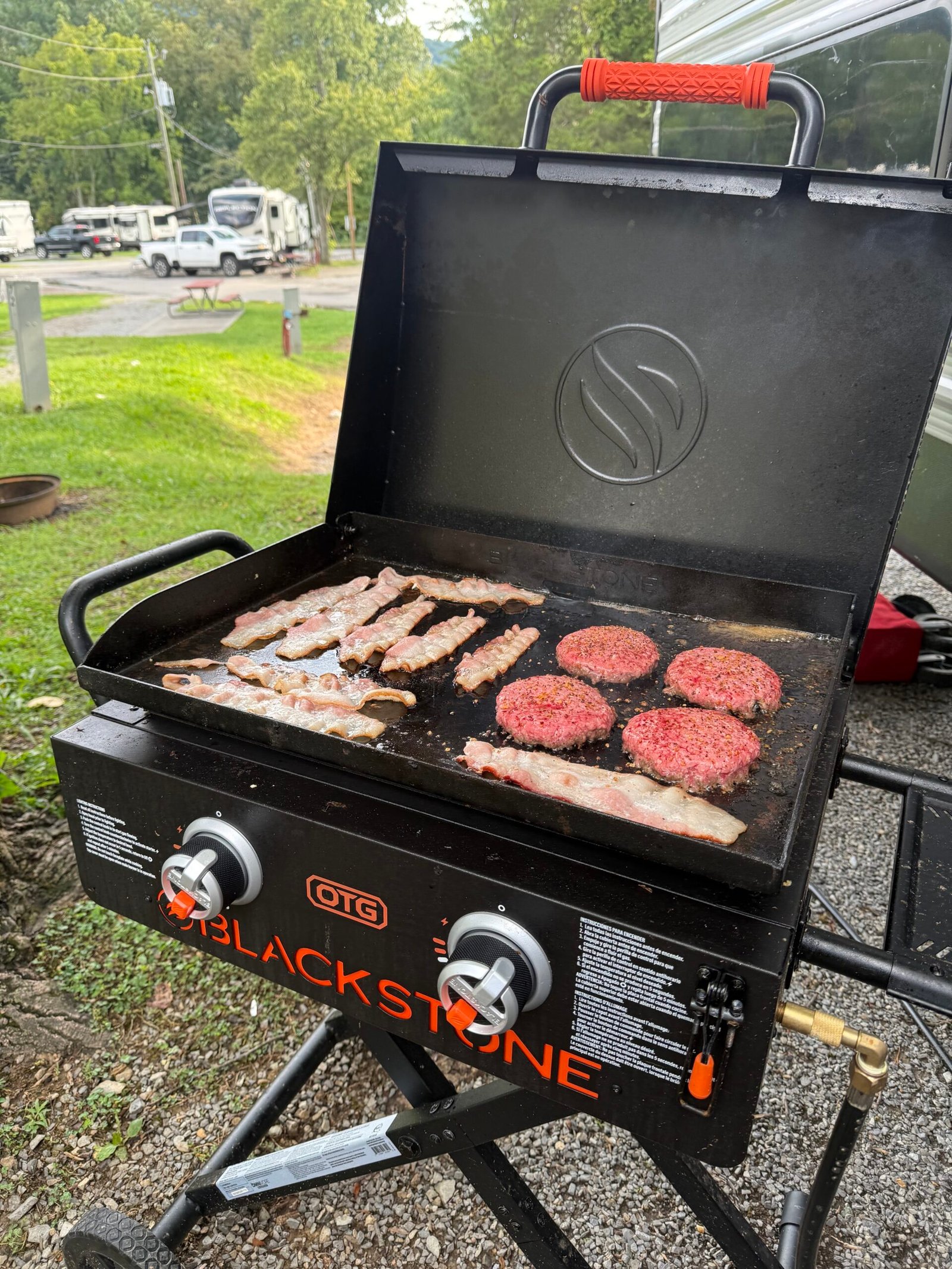 Blackstone griddle in use beside the RV Fam Adventure camper