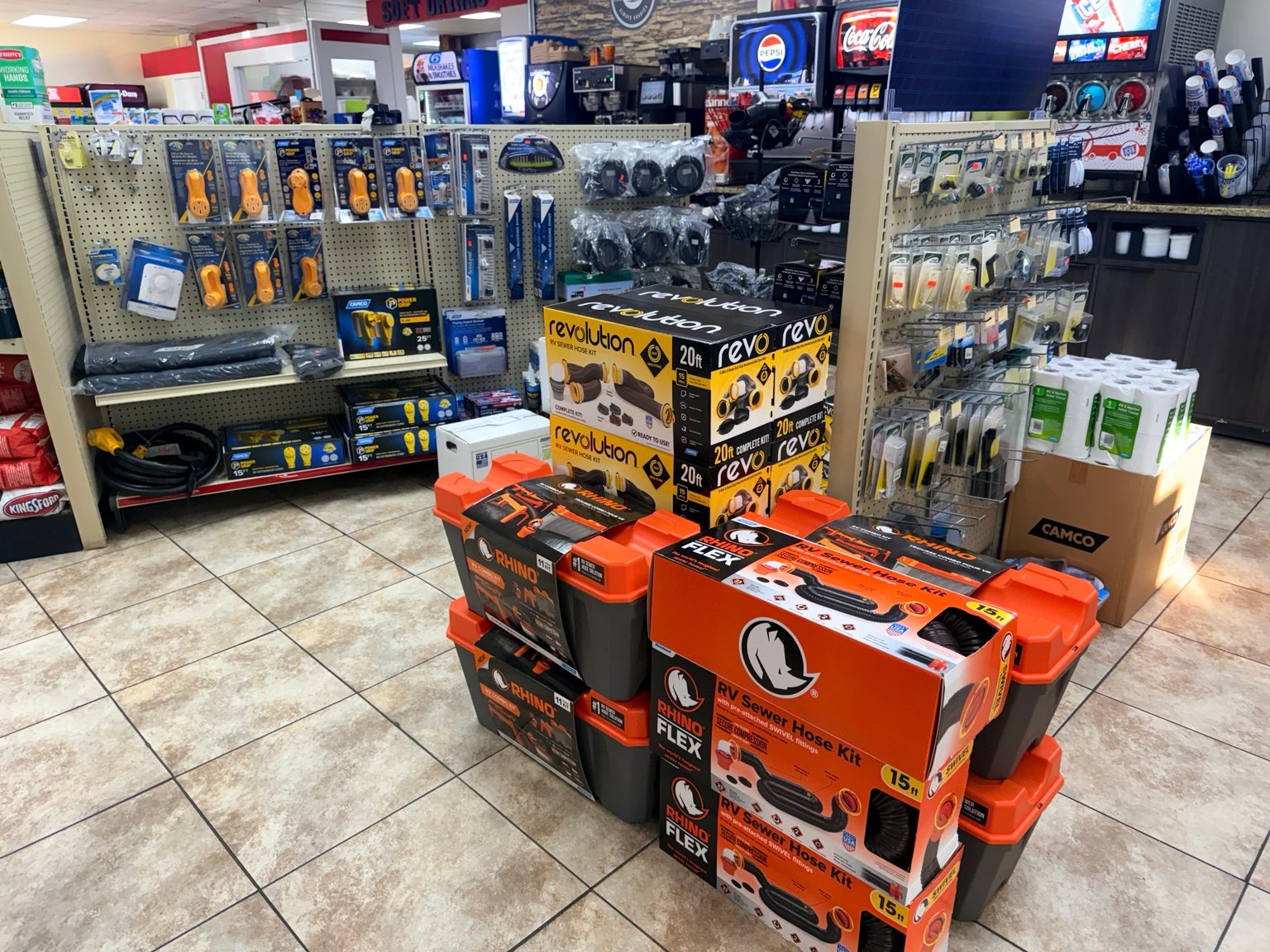 RV sewer kits, repair parts, and camping supplies displayed inside the Clabough's Campground store.